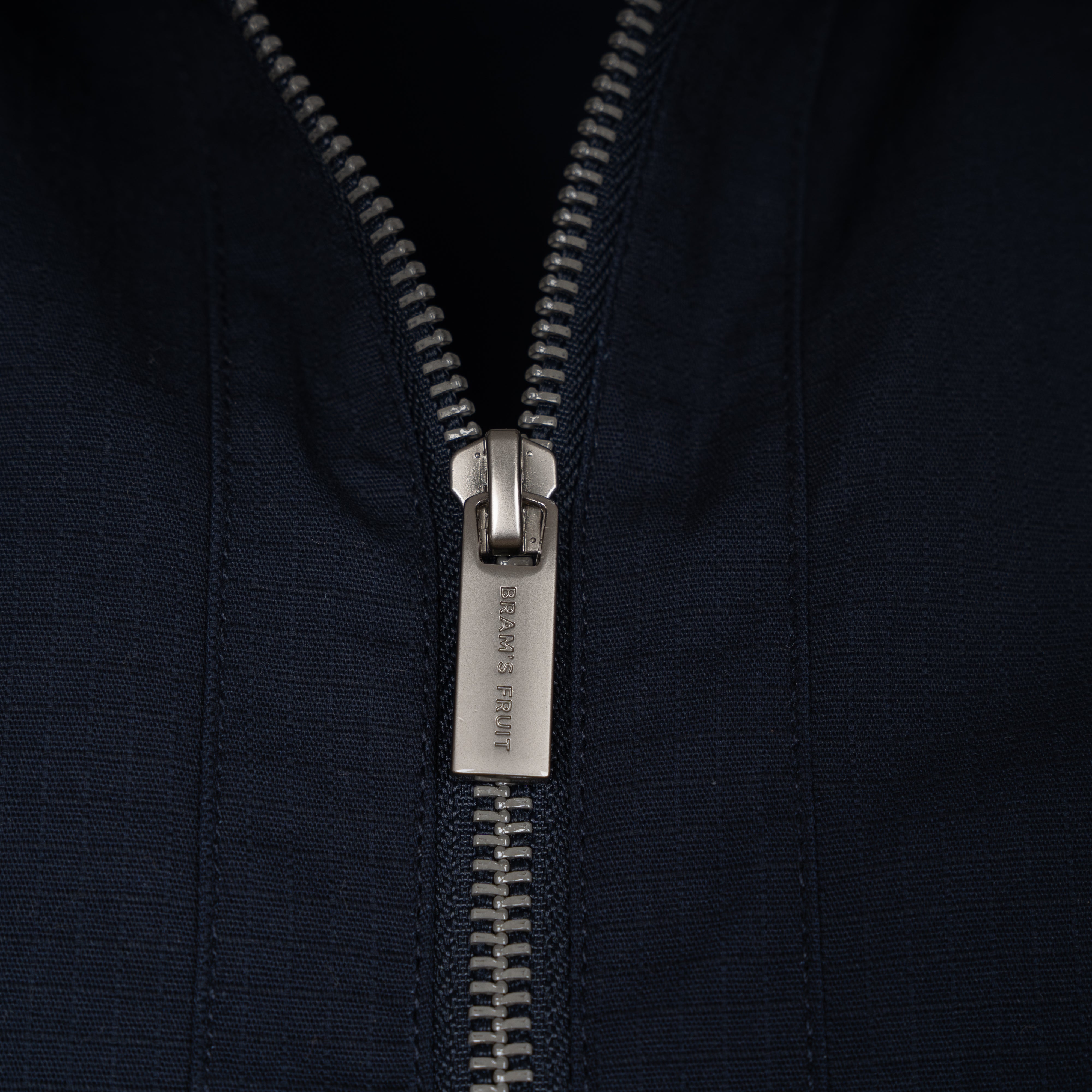 Bram's Fruit Jack Blauw | Ripstop Text Logo