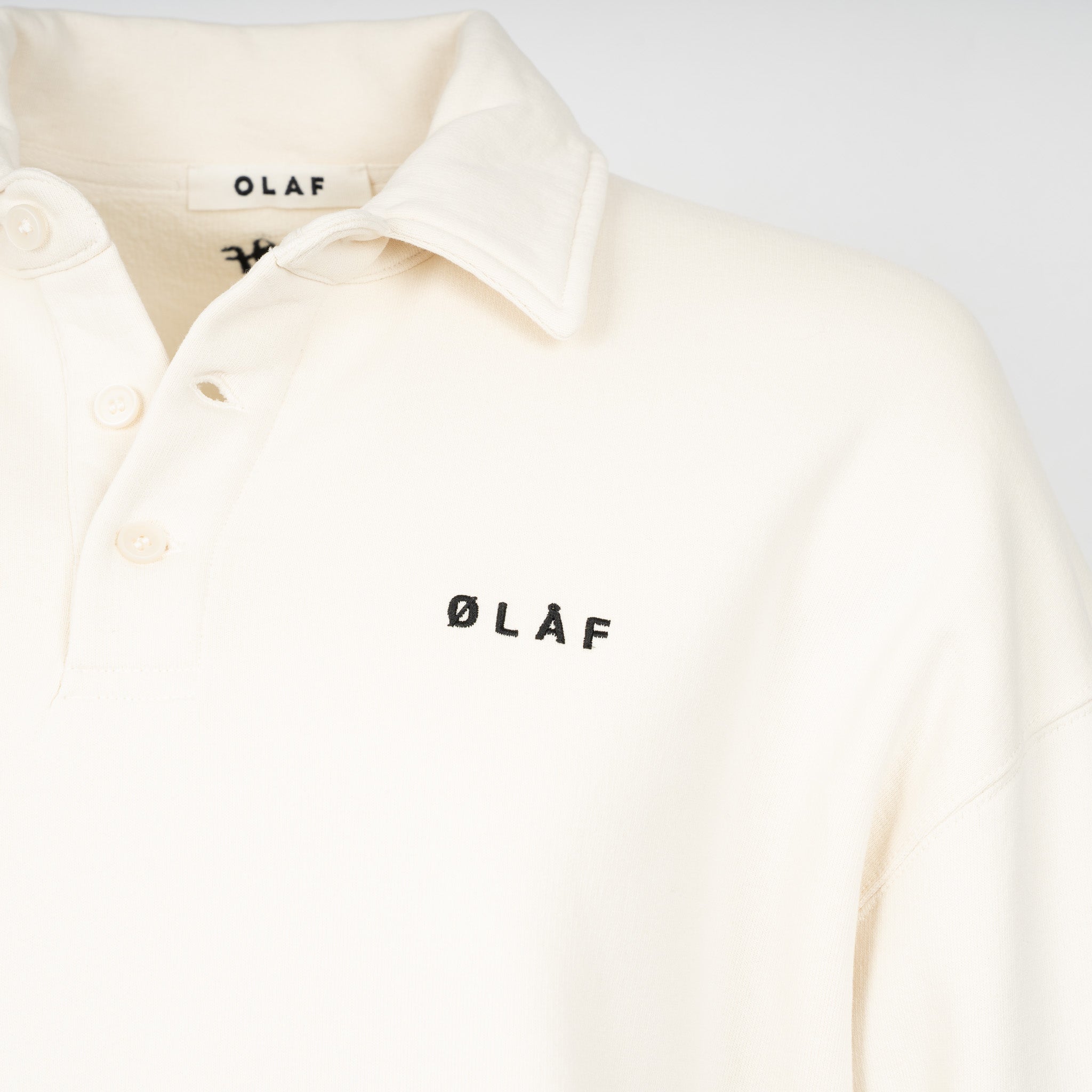 Olaf Polosweater Crème | Script Friends