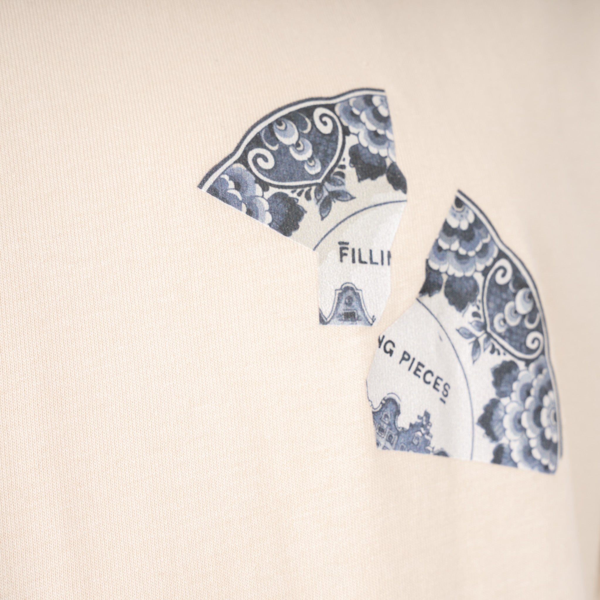 Filling Pieces T-Shirt Backprint Crème | Broken Plate