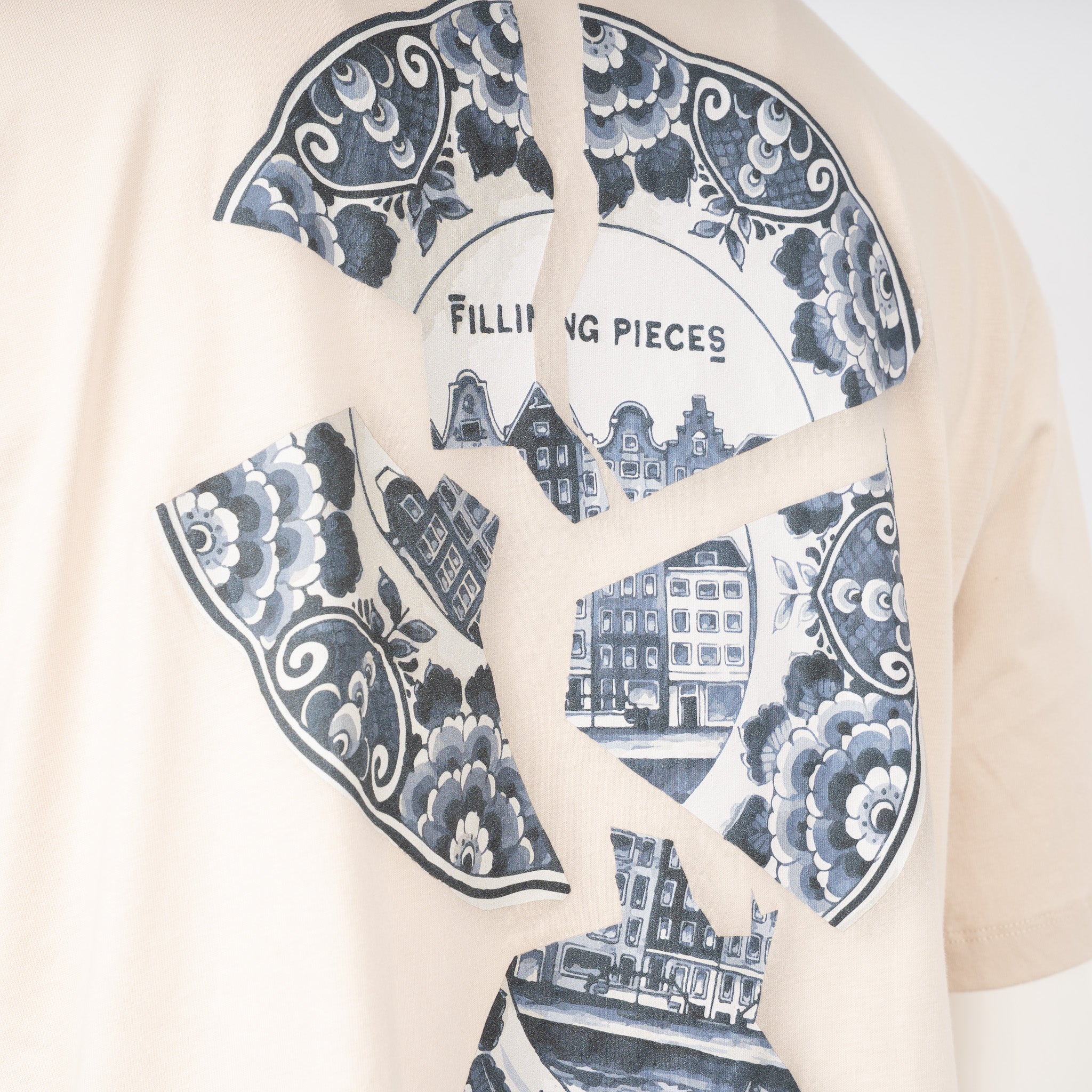 Filling Pieces T-Shirt Backprint Crème | Broken Plate